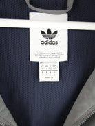 Adidas Windbreaker Grau L – Etikett