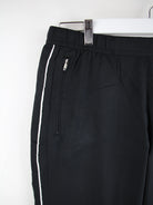 Nike Track Pants Schwarz M – Detailansicht Vorderseite
